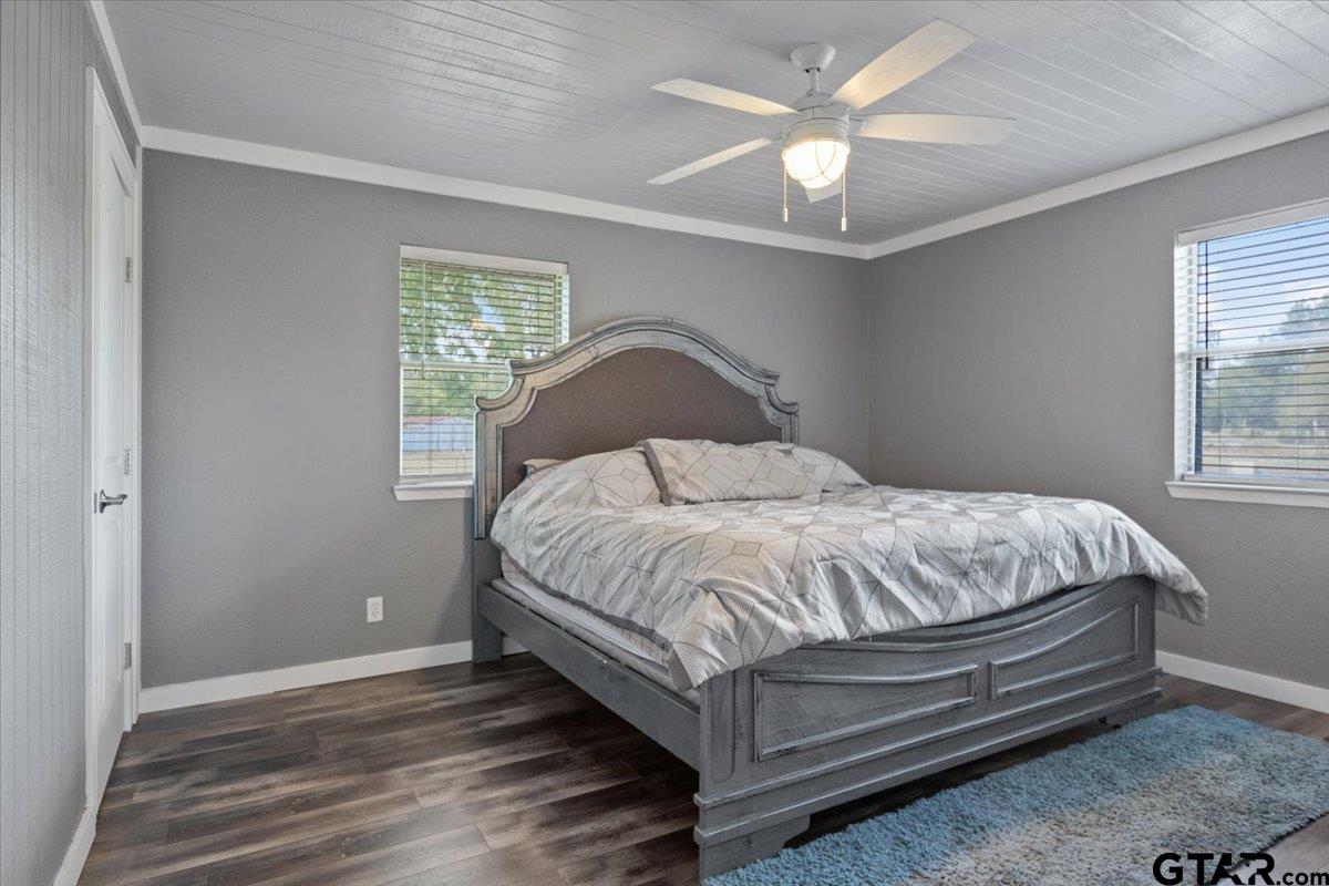 594 County Rd NE 2120 Talco, TX 75487 - Photo 13 of 36 a bedroom with a bed and window