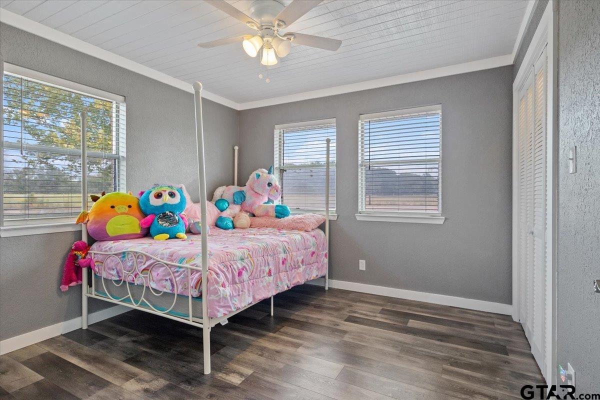 594 County Rd NE 2120 Talco, TX 75487 - Photo 20 of 36 a bedroom with a bed and window