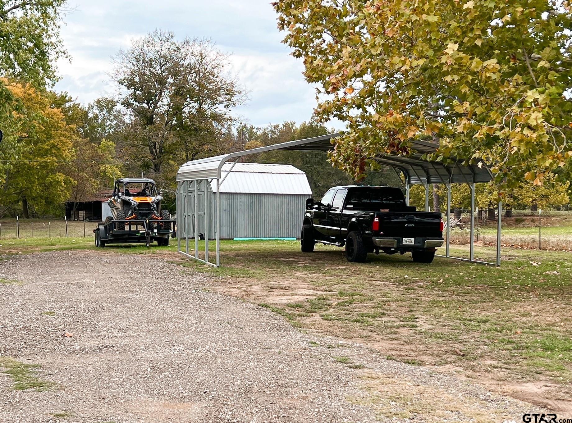 594 County Rd NE 2120 Talco, TX 75487 - Photo 26 of 36 a car parked in front of a house