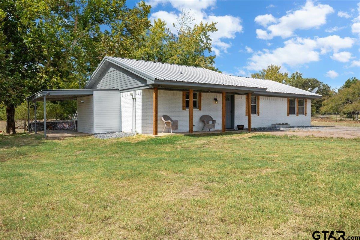 594 County Rd NE 2120 Talco, TX 75487 - Photo 3 of 36 a view of a house with pool and chairs
