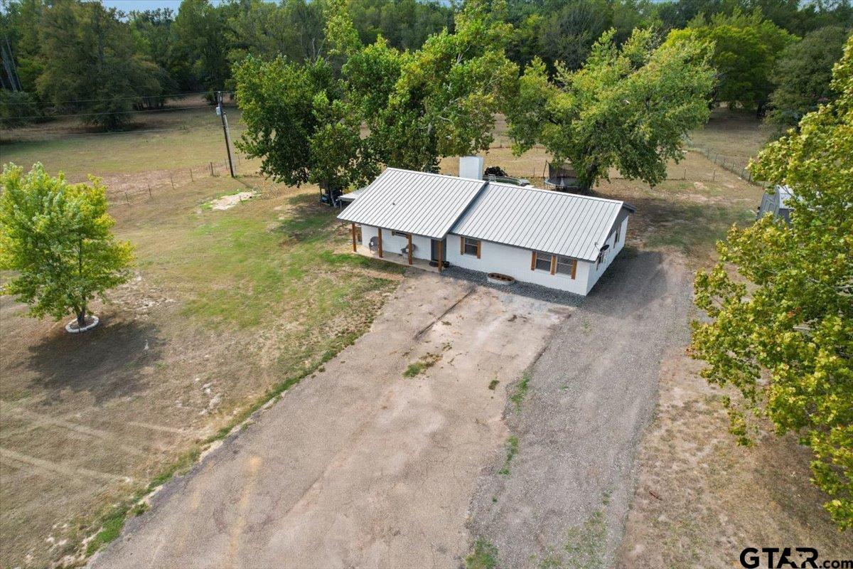 594 County Rd NE 2120 Talco, TX 75487 - Photo 31 of 36 an aerial view of a house with outdoor space