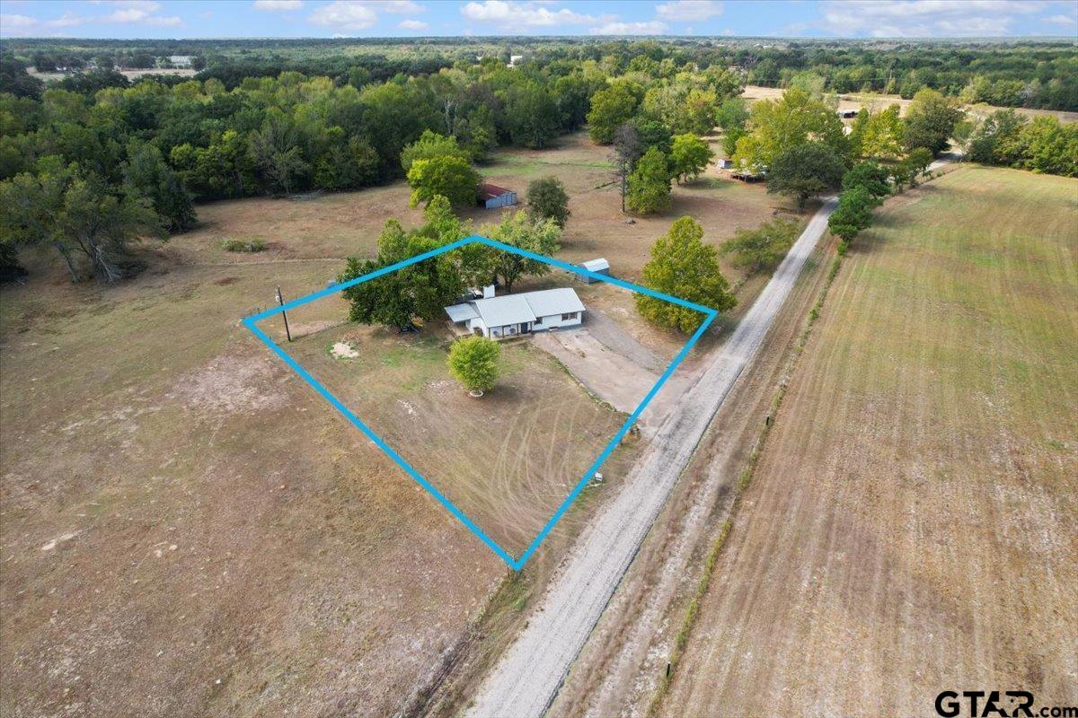 594 County Rd NE 2120 Talco, TX 75487 - Photo 4 of 36 an aerial view of a house with a ocean view