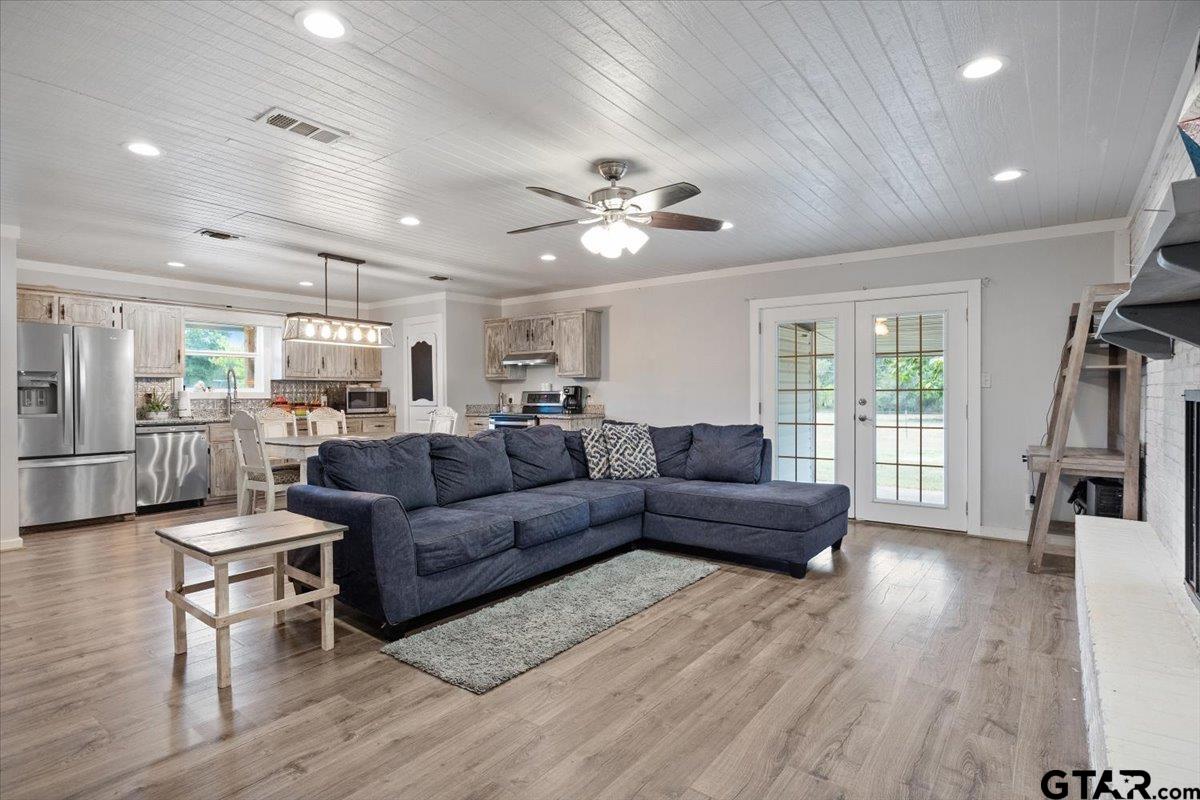 594 County Rd NE 2120 Talco, TX 75487 - Photo 5 of 36 a living room with furniture and a large window