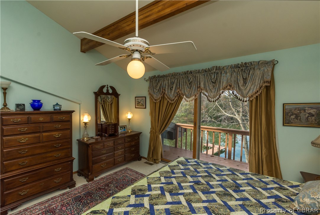 297 Cove Colony Road Lancaster, VA 22503 - Photo 23 of 50 a bedroom with a bed and a window