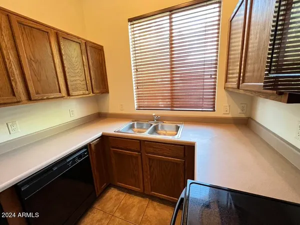 a kitchen with a stove and a microwave