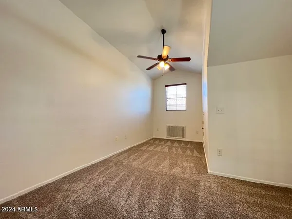 a front view of a house with a garage