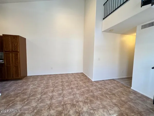a kitchen with stainless steel appliances a refrigerator and a sink