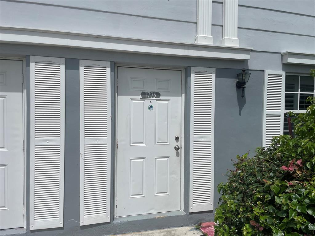 1775 Southwest 81st Way Davie, FL 33324 - Photo 1 of 35 a view of a house with entryway