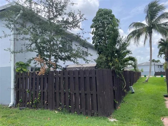 a car parked in front of a house