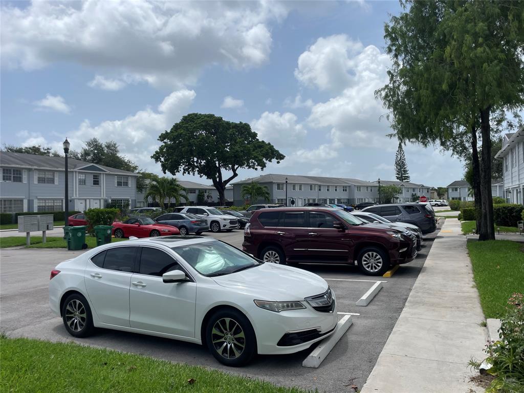 1775 Southwest 81st Way Davie, FL 33324 - Photo 26 of 35 a car parked in front of a house