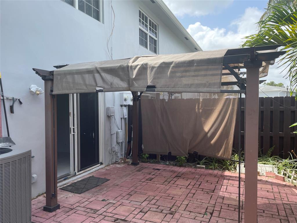 1775 Southwest 81st Way Davie, FL 33324 - Photo 31 of 35 a front view of a house with a yard