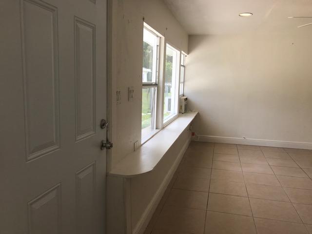 2545 2nd Avenue Northeast Palm Bay, FL 32905 - Photo 12 of 32 a view of an empty room with a window