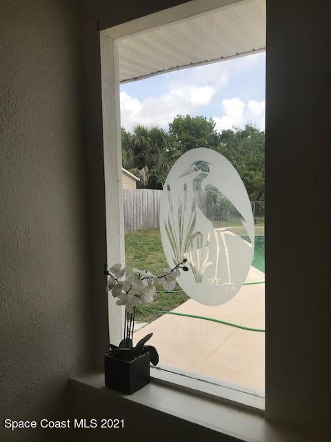 2545 2nd Avenue Northeast Palm Bay, FL 32905 - Photo 13 of 32 a view of a glass door
