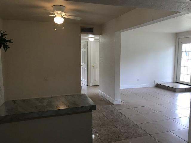 2545 2nd Avenue Northeast Palm Bay, FL 32905 - Photo 18 of 32 an empty room with windows and entrance