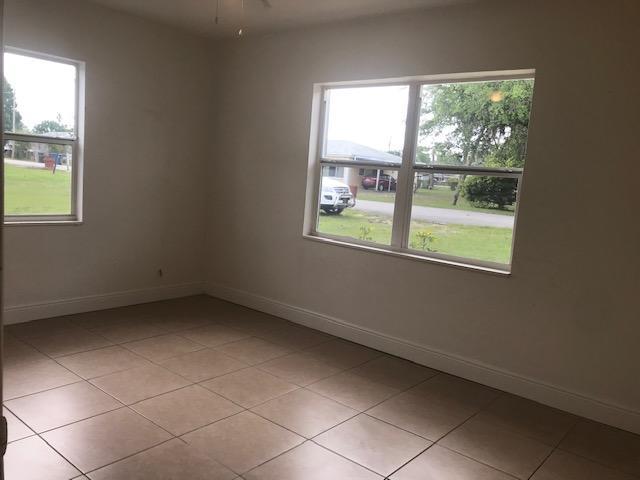 2545 2nd Avenue Northeast Palm Bay, FL 32905 - Photo 20 of 32 a view of an empty room with a window