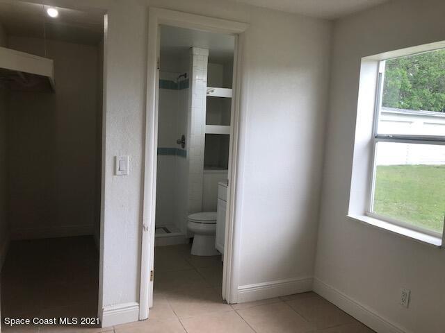 2545 2nd Avenue Northeast Palm Bay, FL 32905 - Photo 23 of 32 a bathroom with a toilet