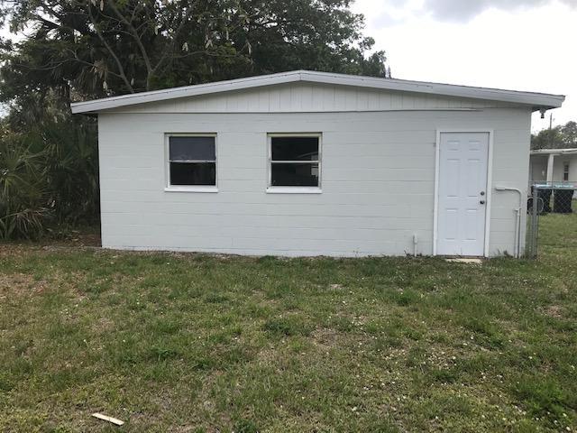 2545 2nd Avenue Northeast Palm Bay, FL 32905 - Photo 28 of 32 a view of a backyard
