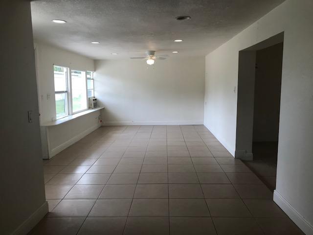 2545 2nd Avenue Northeast Palm Bay, FL 32905 - Photo 9 of 32 a view of an empty room with a window
