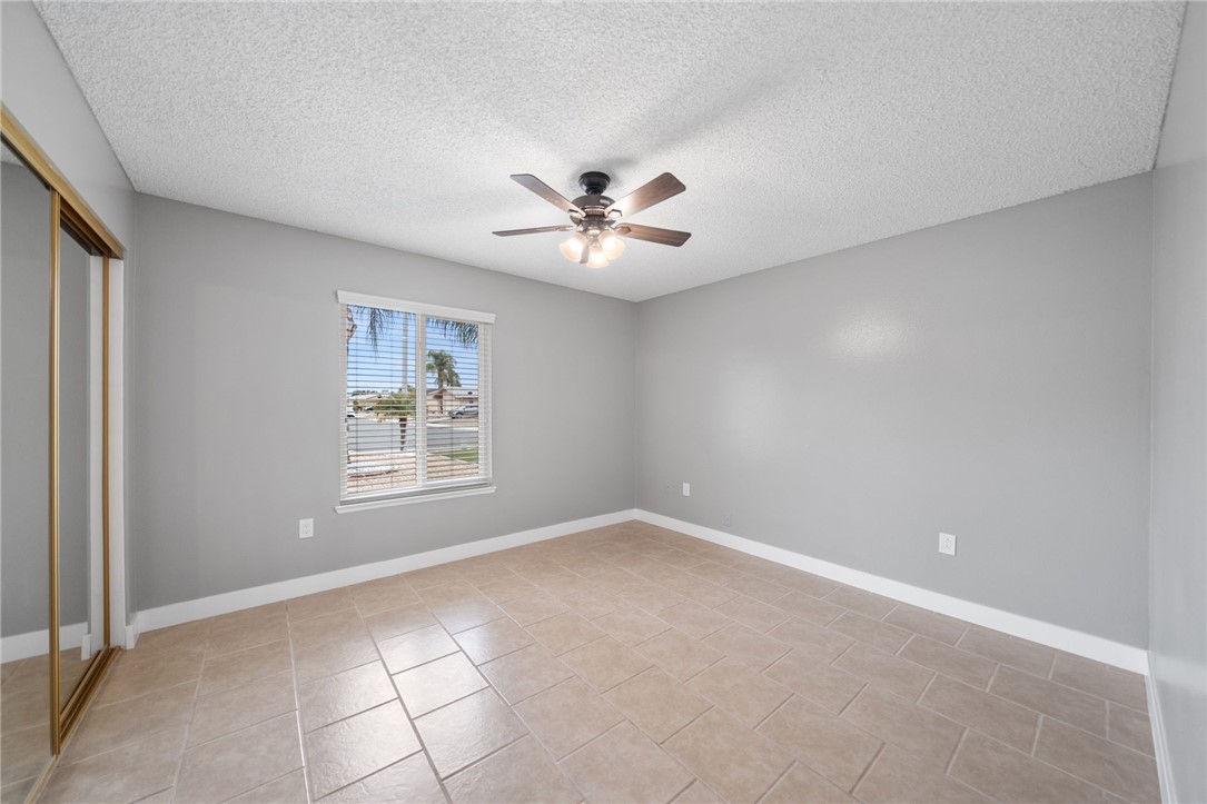 26932 Howard Street Menifee, CA 92586 - Photo 11 of 28 a view of an empty room with a window