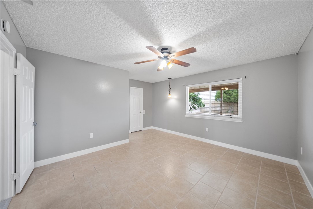 26932 Howard Street Menifee, CA 92586 - Photo 13 of 28 a view of an empty room with a window