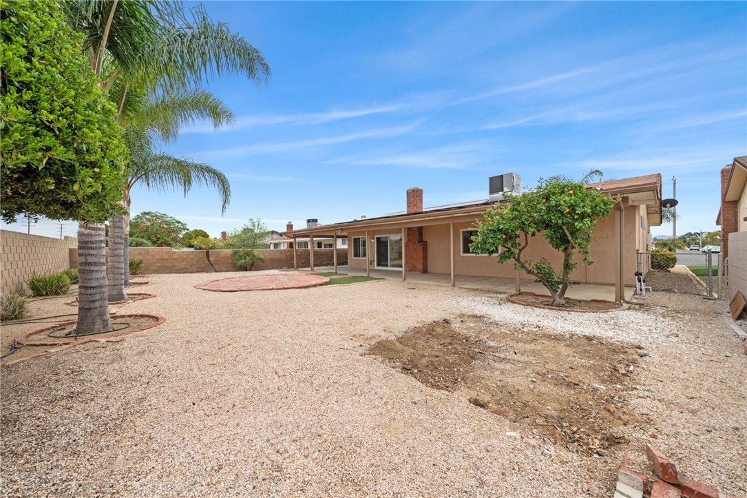 26932 Howard Street Menifee, CA 92586 - Photo 23 of 28 a front view of a house with a yard