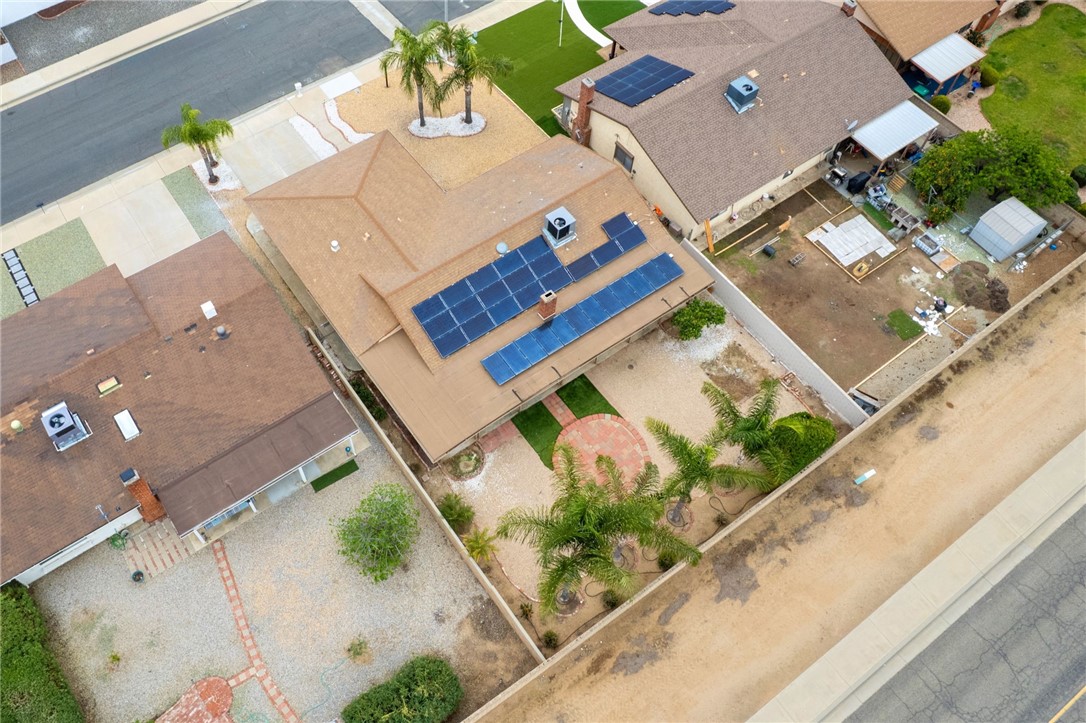 26932 Howard Street Menifee, CA 92586 - Photo 28 of 28 an aerial view of a house with a garden and mountain view
