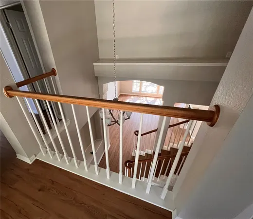 a view of entryway with wooden floor