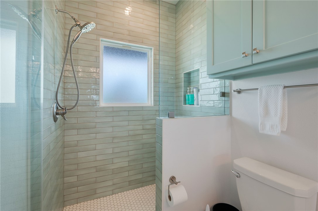 2970 County Road 270 Cameron, TX 76520 - Photo 22 of 50 a bathroom with a shower and a toilet