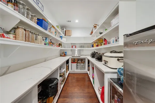 a storage room with washer and dryer