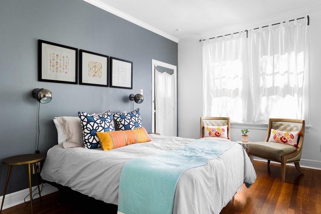 3812 Duval Street Austin, TX 78751 - Photo 17 of 22 a bedroom with a bed and a couch