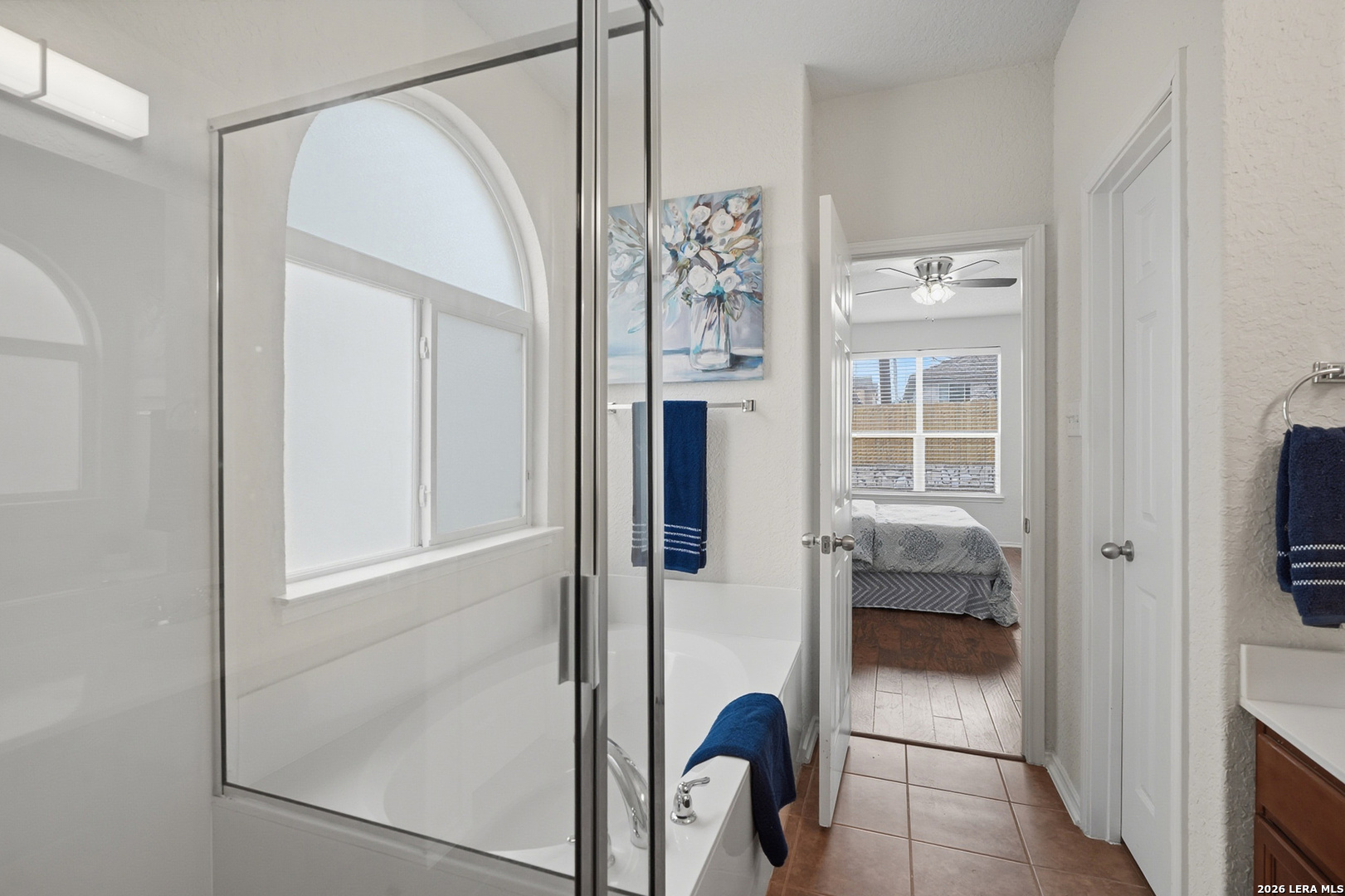 9519 Gold Stage Road San Antonio, TX 78254 - Photo 14 of 25 a view of hallway with furniture and chandelier