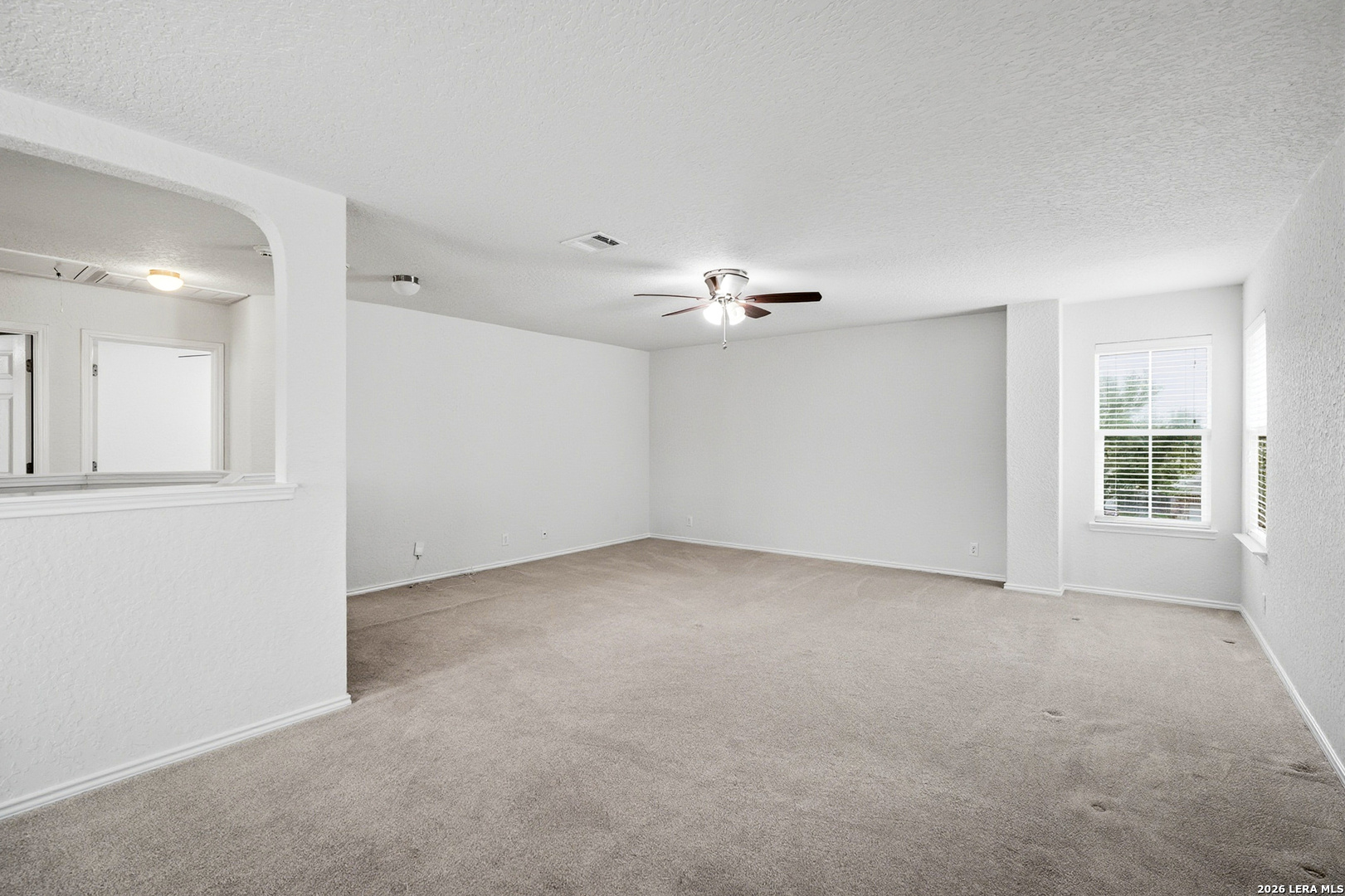 9519 Gold Stage Road San Antonio, TX 78254 - Photo 16 of 25 a view of an empty room with a window