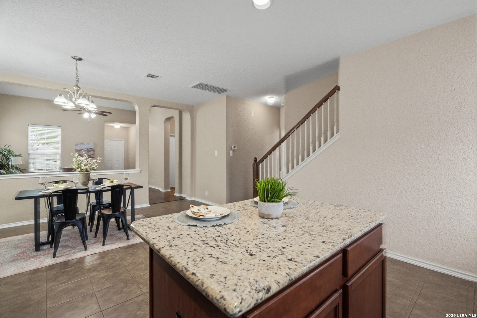 9519 Gold Stage Road San Antonio, TX 78254 - Photo 8 of 25 a kitchen with a table and chairs
