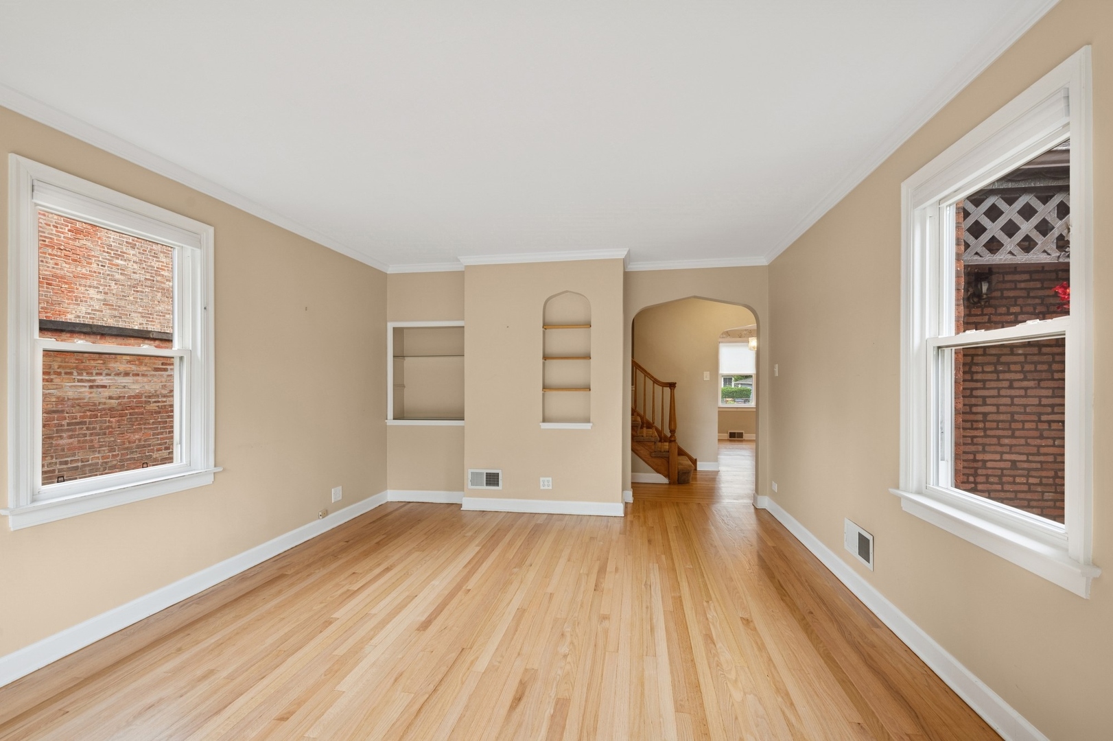 2324 South 11th Avenue Riverside, IL 60546 - Photo 4 of 15 a view of a room with wooden floor staircase and a living room