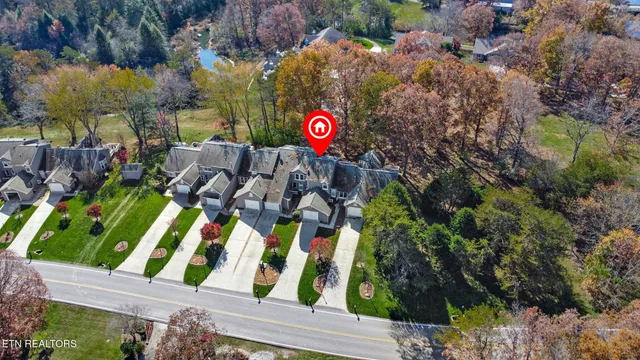 a view of swimming pool with sitting area