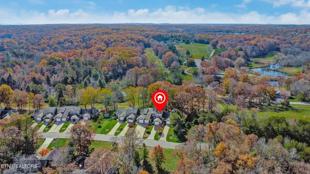 an aerial view of residential house with parking space