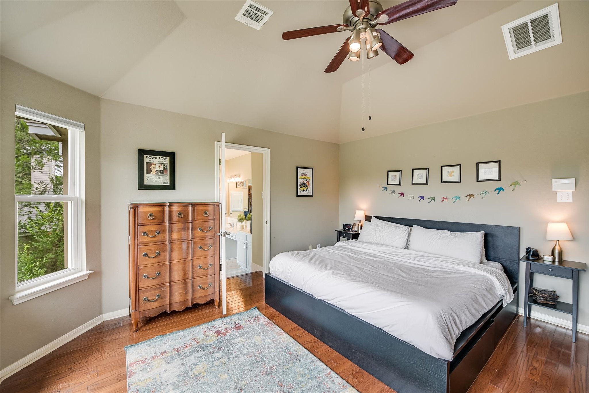6456 Ruxton Lane Austin, TX 78749 - Photo 16 of 30 Hardwood floors and vaulted ceilings create an inviting bedroom sanctuary.