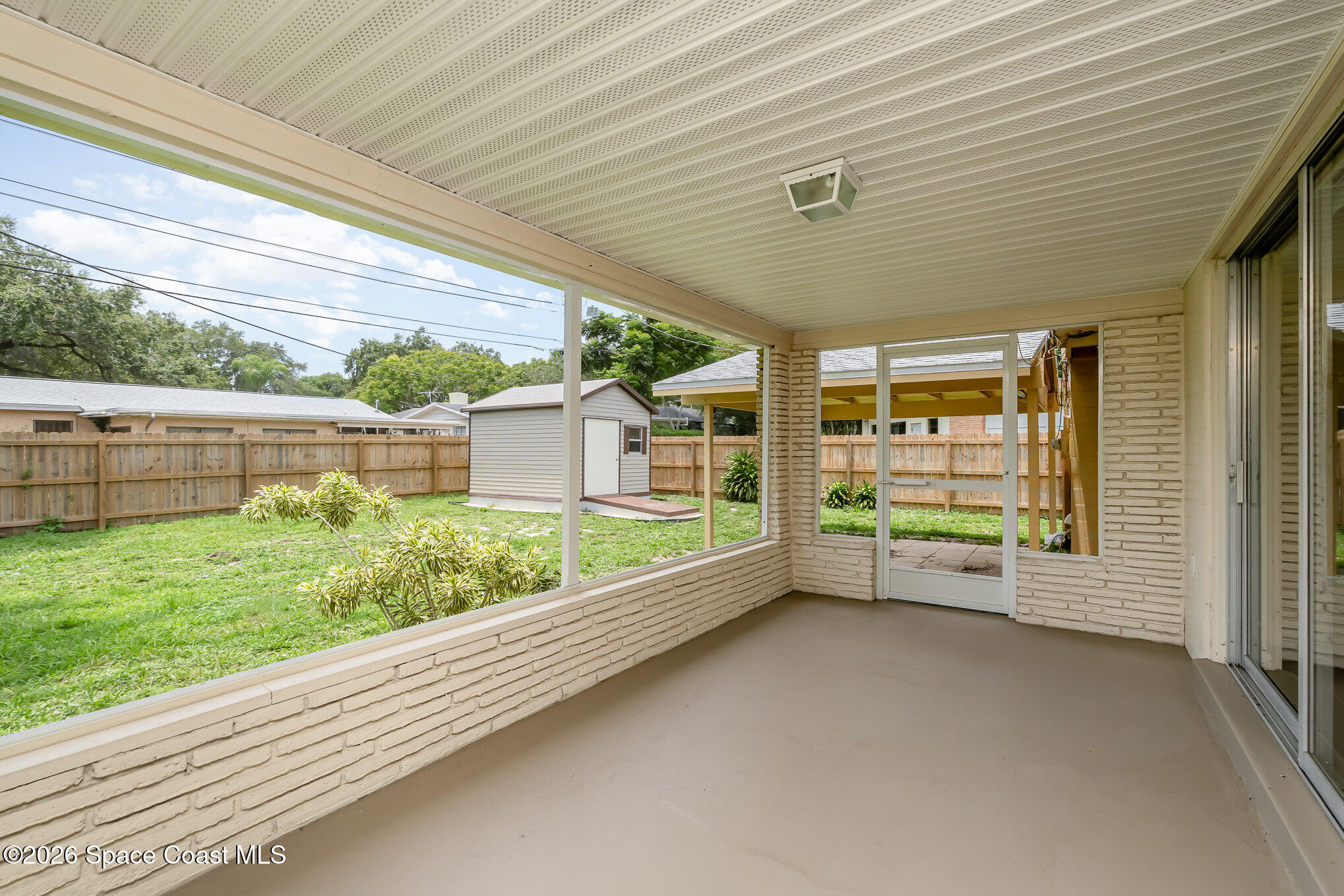 115 Gary Lane Cocoa, FL 32922 - Photo 21 of 29 a view of a porch with furniture and garden