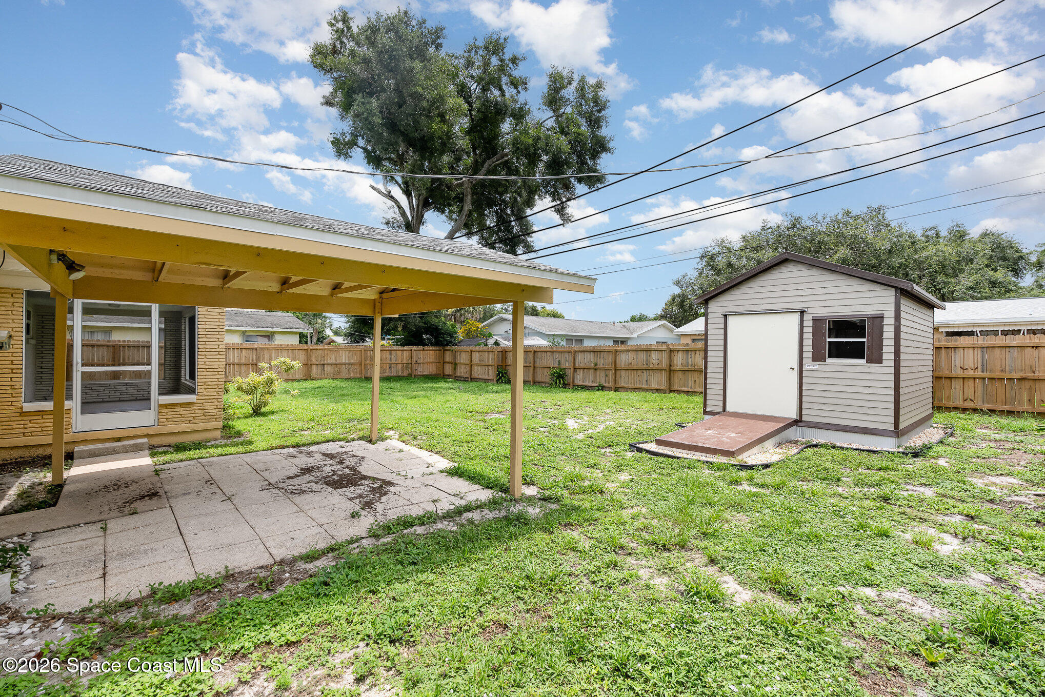 115 Gary Lane Cocoa, FL 32922 - Photo 22 of 29 a view of a house with backyard and porch