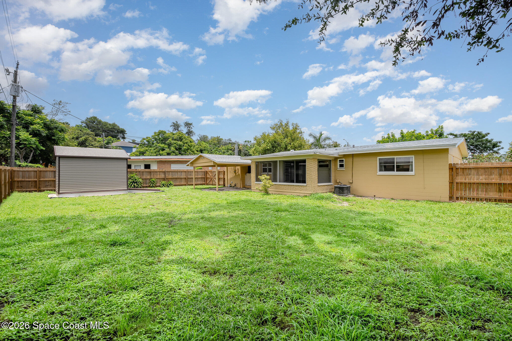 115 Gary Lane Cocoa, FL 32922 - Photo 24 of 29 a view of a house with backyard