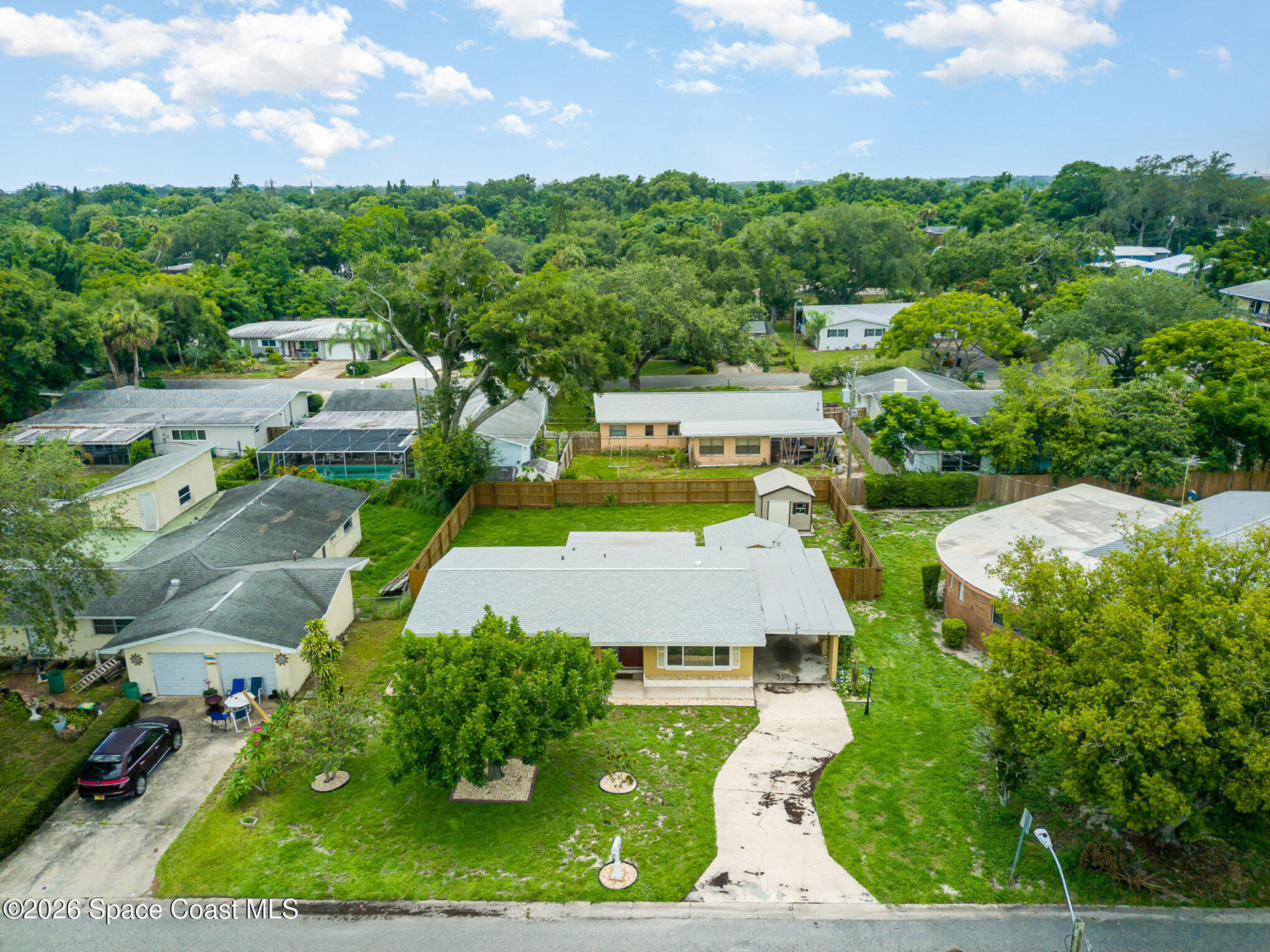 115 Gary Lane Cocoa, FL 32922 - Photo 26 of 29 an aerial view of residential houses with outdoor space and street view