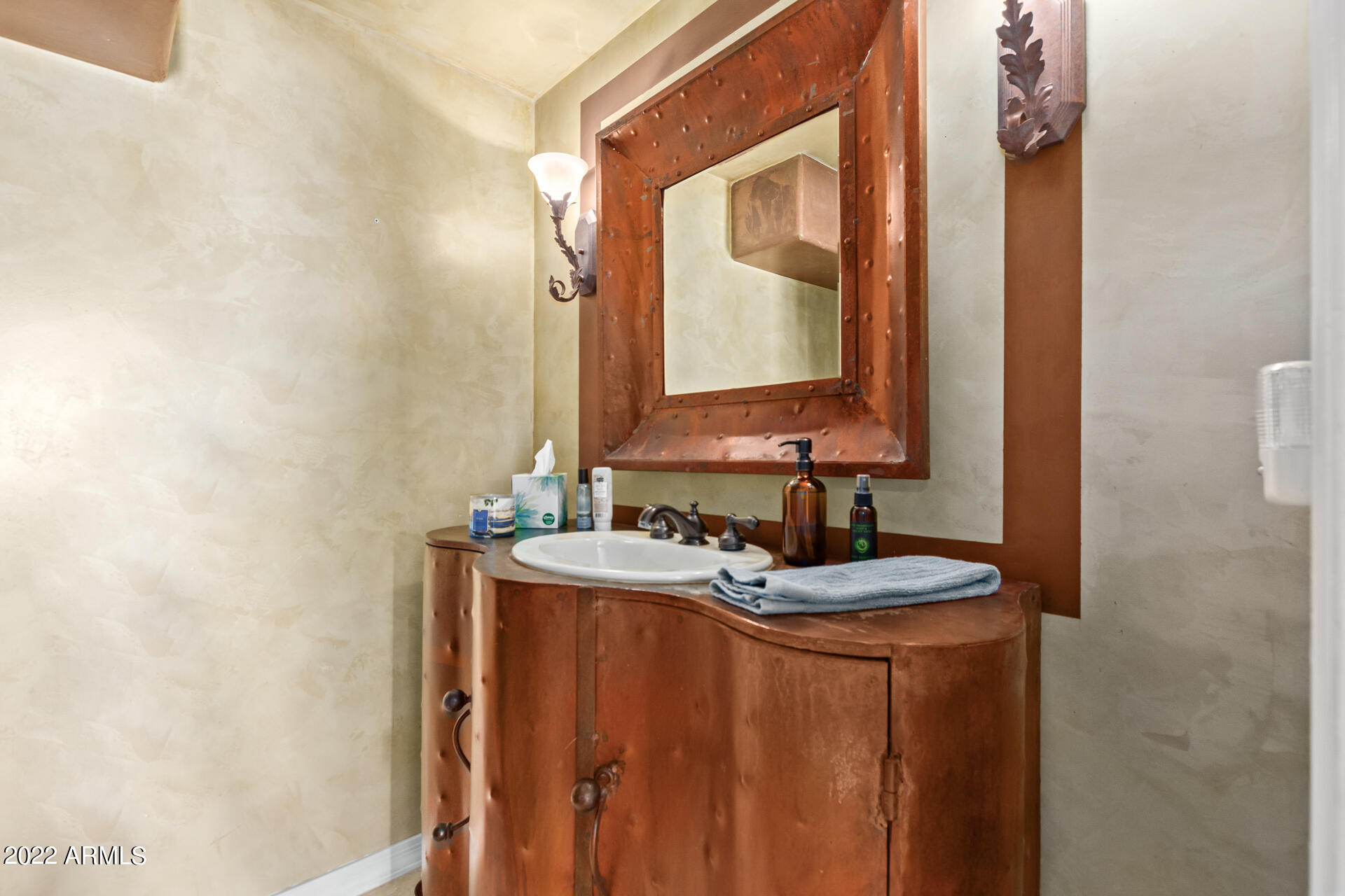625 West Ocotillo Road Phoenix, AZ 85013 - Photo 21 of 55 a bathroom with a sink and a mirror