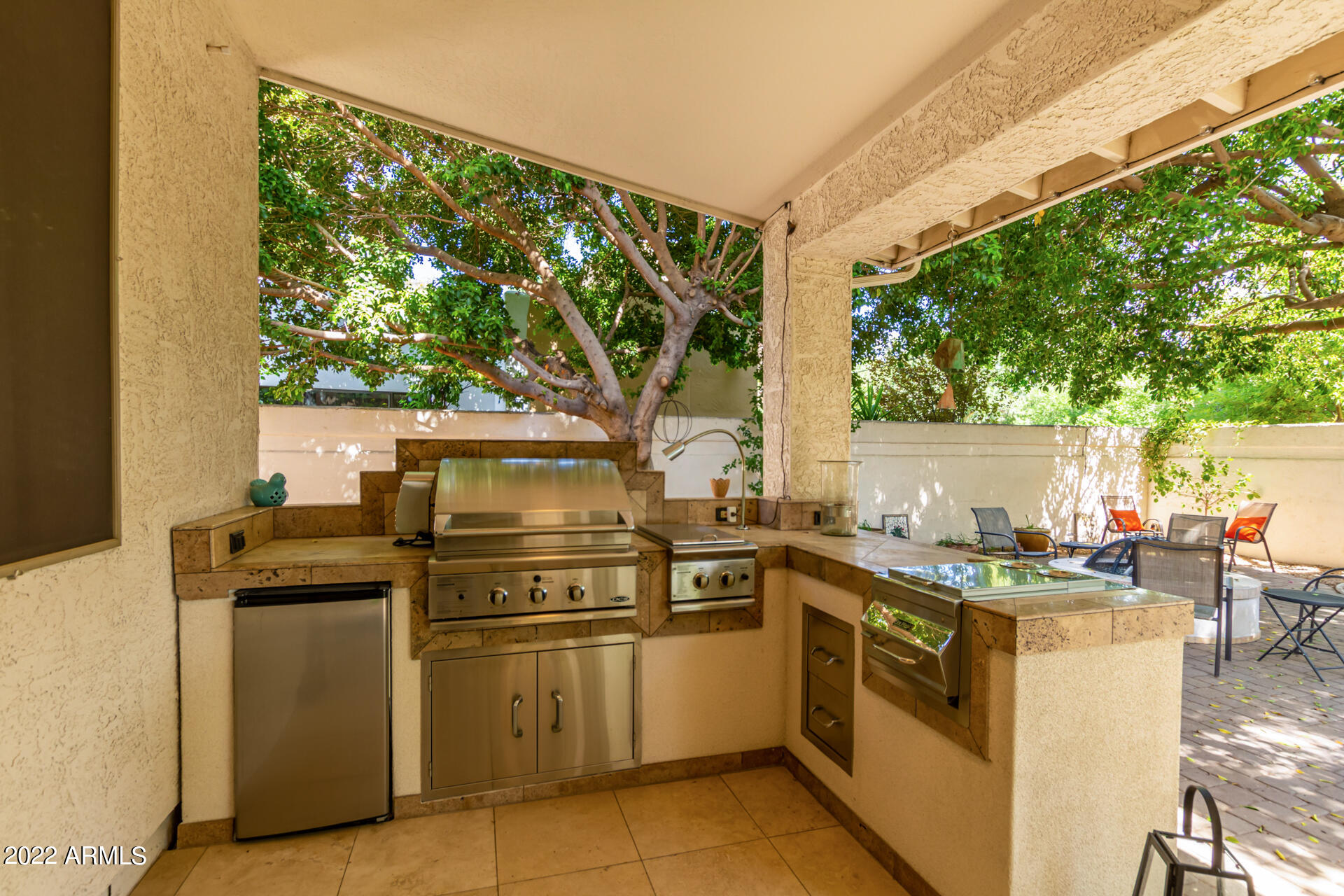 625 West Ocotillo Road Phoenix, AZ 85013 - Photo 3 of 55 a kitchen with stainless steel appliances granite countertop a stove a sink and a refrigerator