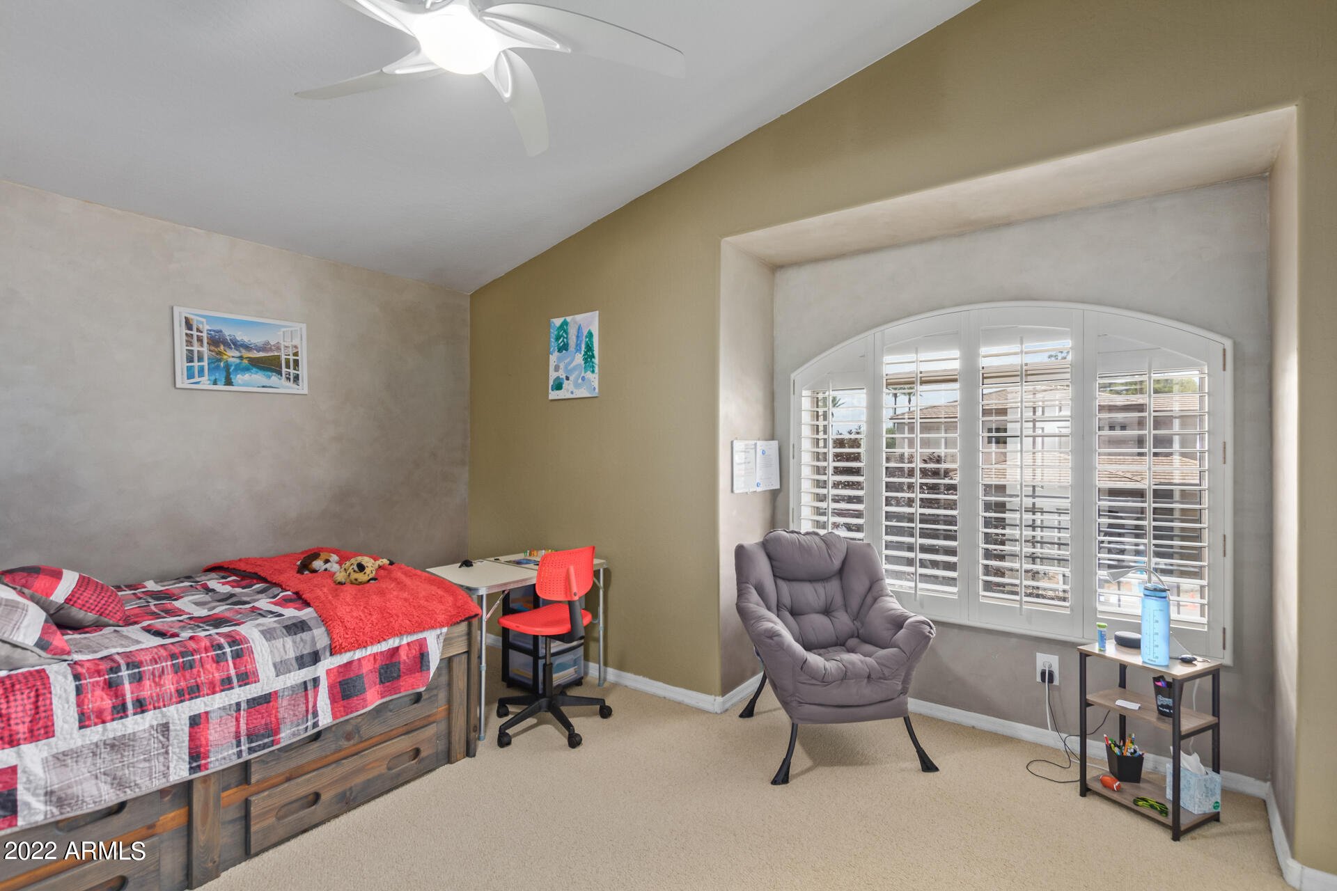 625 West Ocotillo Road Phoenix, AZ 85013 - Photo 36 of 55 a bedroom with a bed and a chandelier