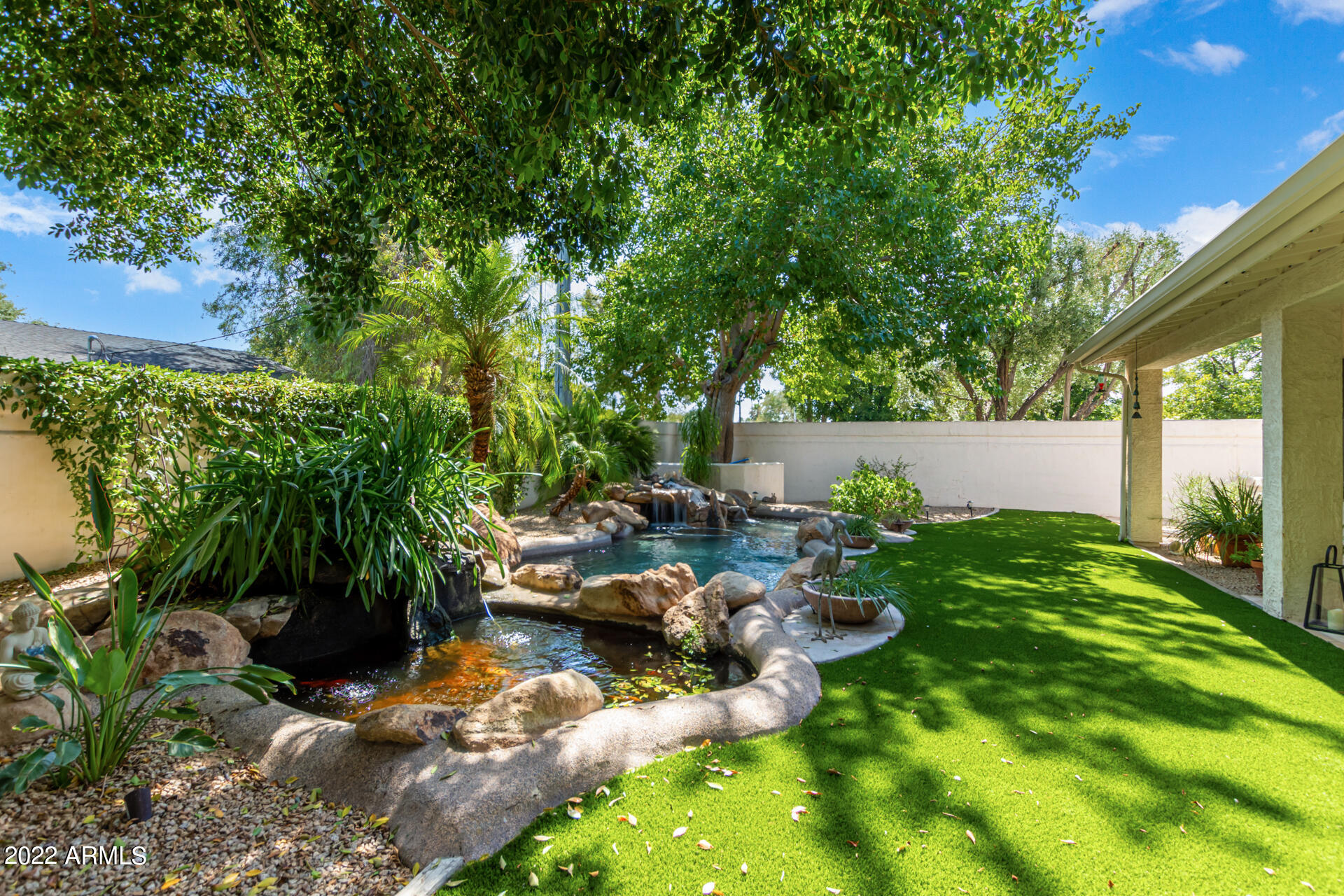 625 West Ocotillo Road Phoenix, AZ 85013 - Photo 45 of 55 a view of a backyard with plants and a patio