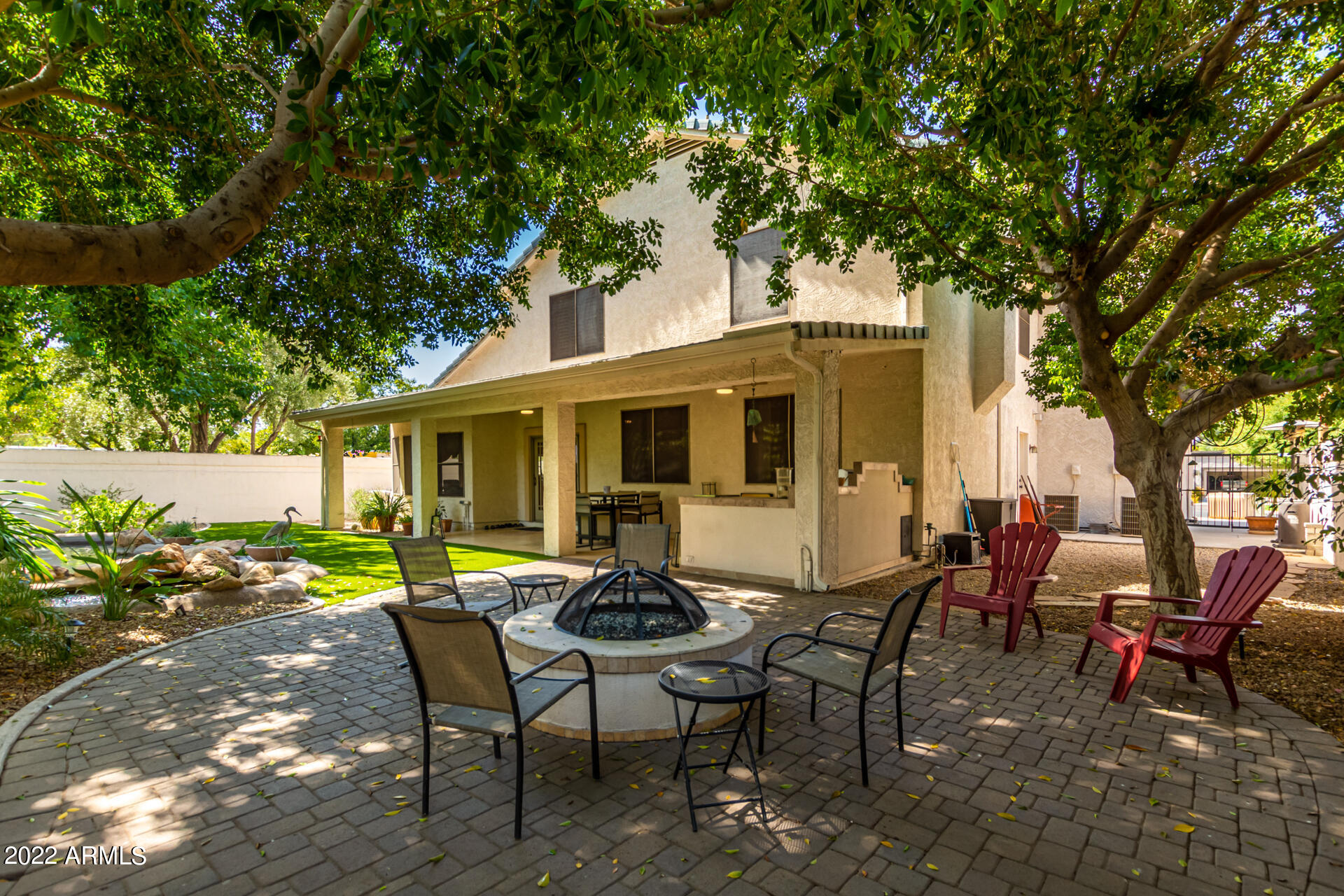 625 West Ocotillo Road Phoenix, AZ 85013 - Photo 48 of 55 a view of a house with backyard sitting area and garden