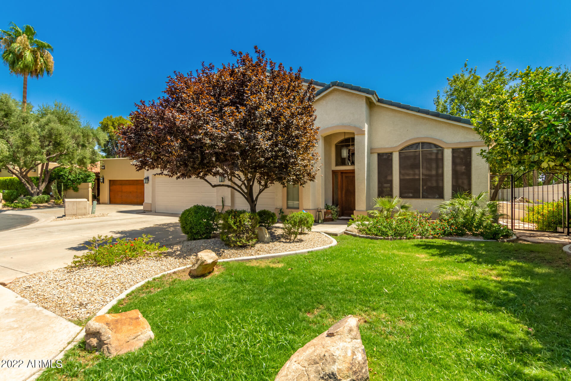 625 West Ocotillo Road Phoenix, AZ 85013 - Photo 6 of 55 a front view of a house with a yard