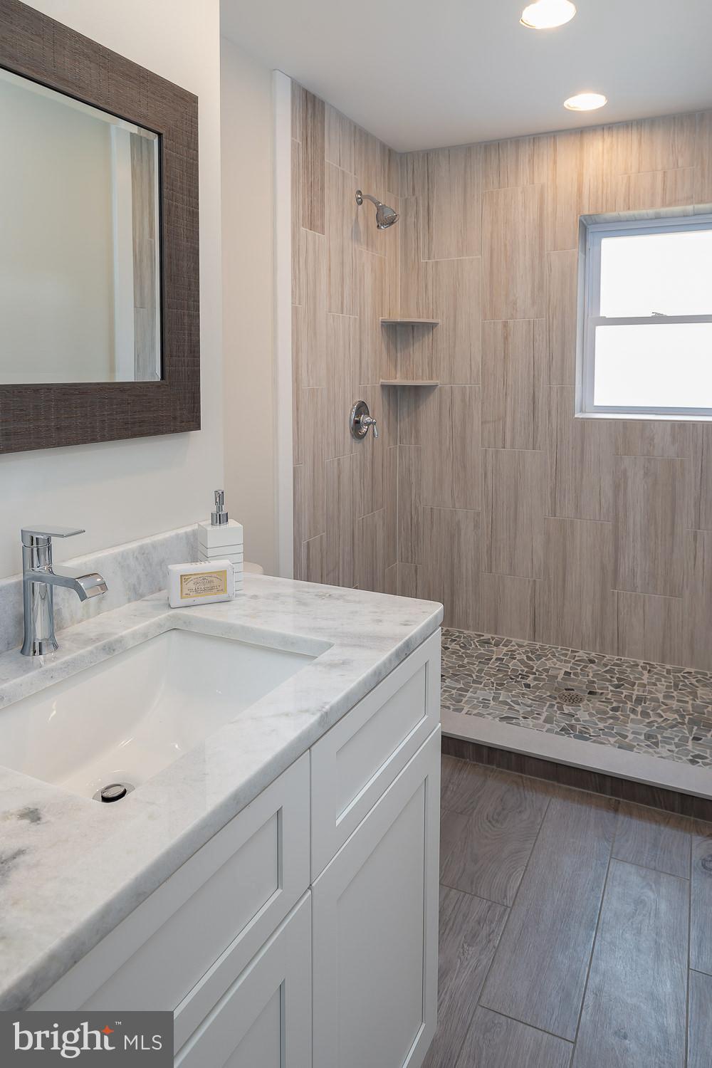 402 Golfview Road Wallingford, PA 19086 - Photo 13 of 24 First floor full bathroom