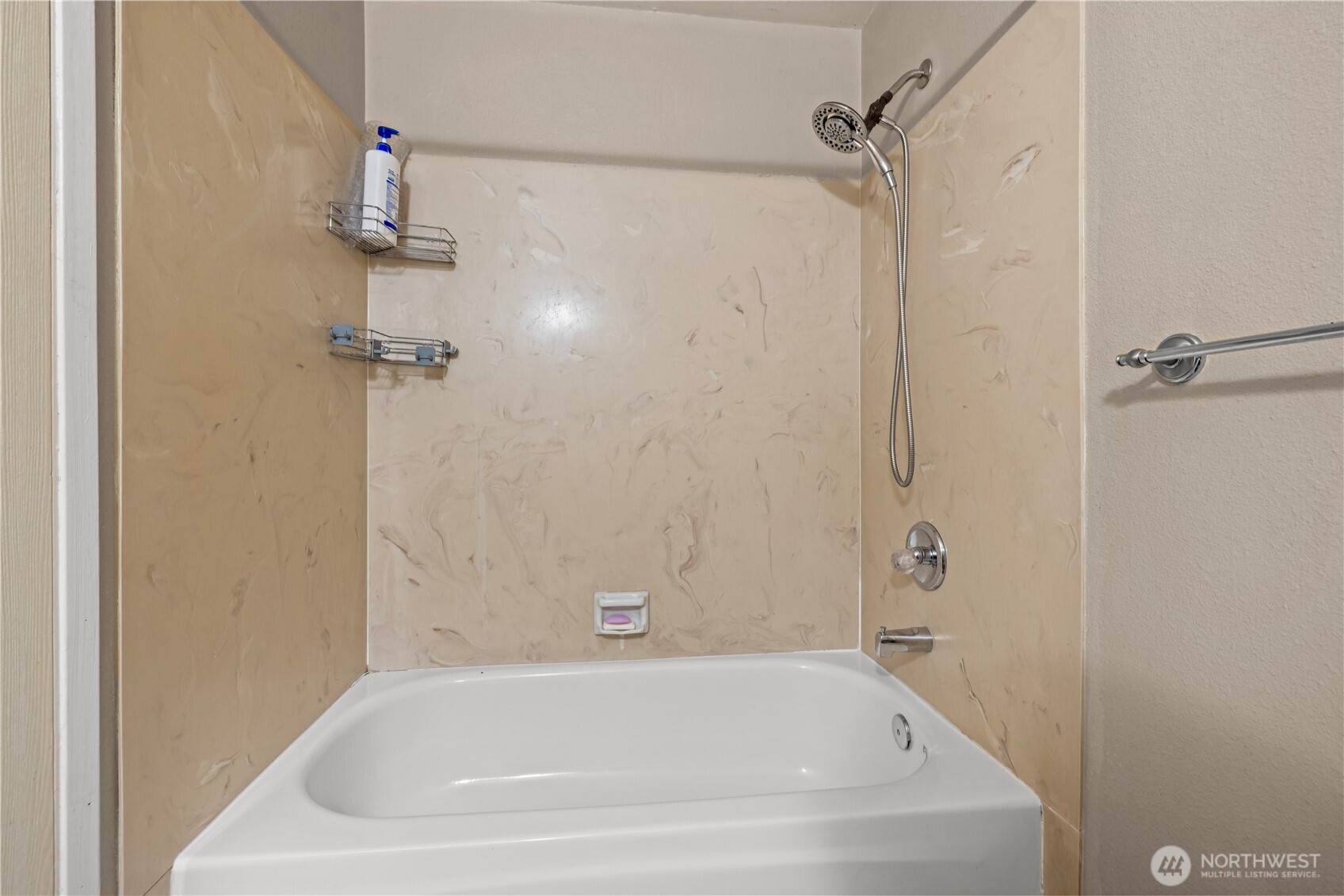 1601 Olympia Avenue Southeast Renton, WA 98058 - Photo 12 of 28 a white bath tub sitting next to a white sink and vanity