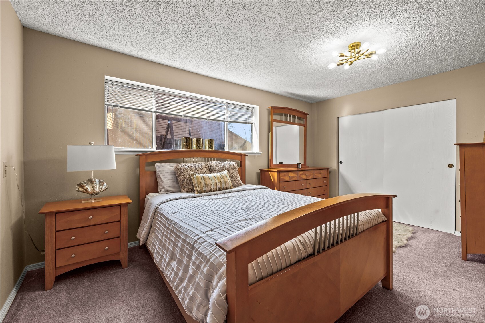 1601 Olympia Avenue Southeast Renton, WA 98058 - Photo 20 of 28 a bedroom with a bed and a window